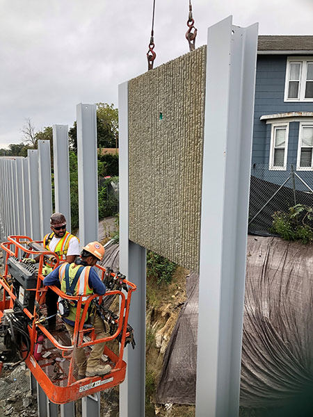 Installation of noise wall panels on I-95